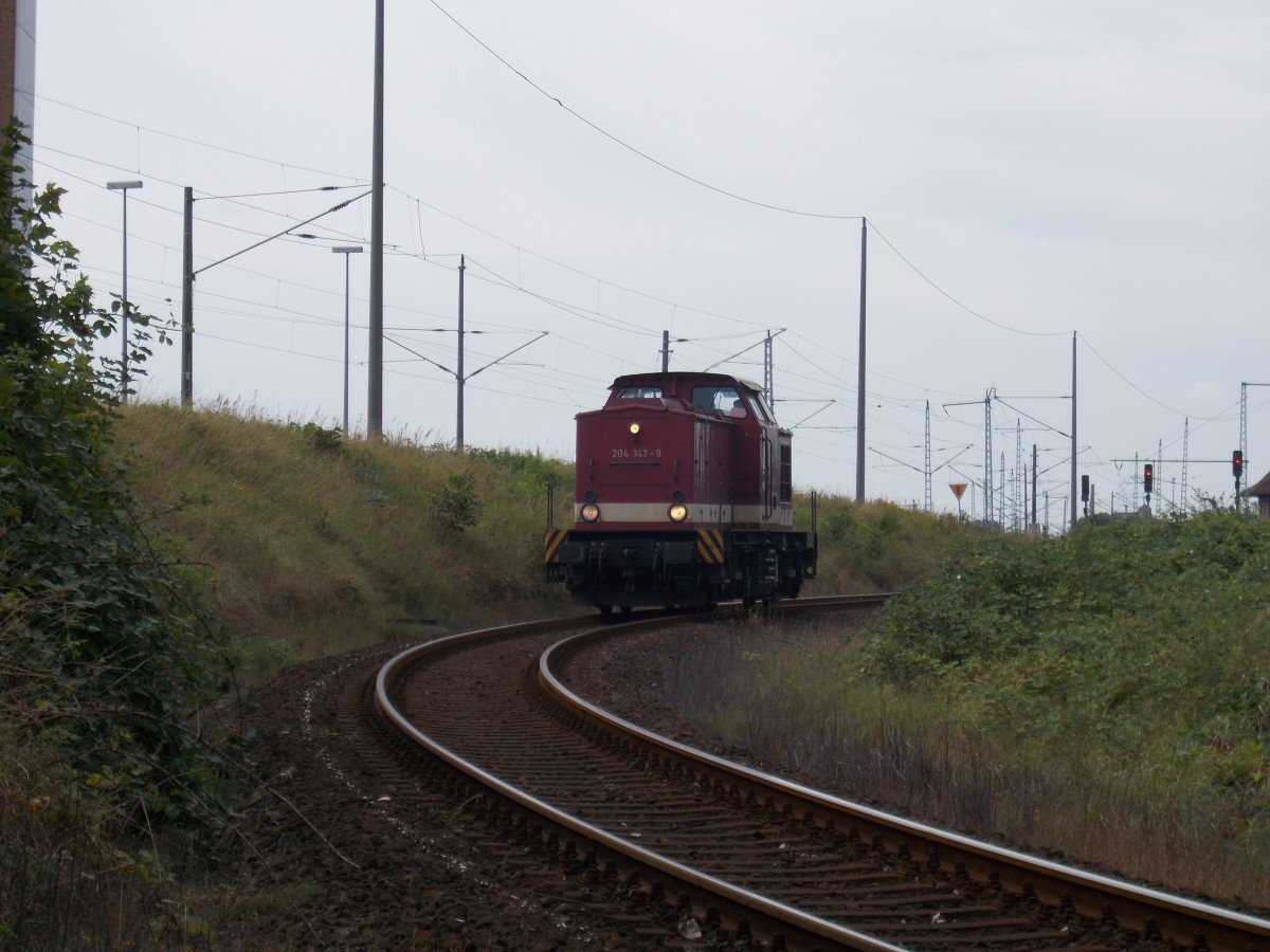 Die MTEG 204 347 auf dem Stralsunder Zufahrtsgleis vom Nord-und Südhafen zum Bahnhof Stralsund Rügendamm am 10.August 2014.