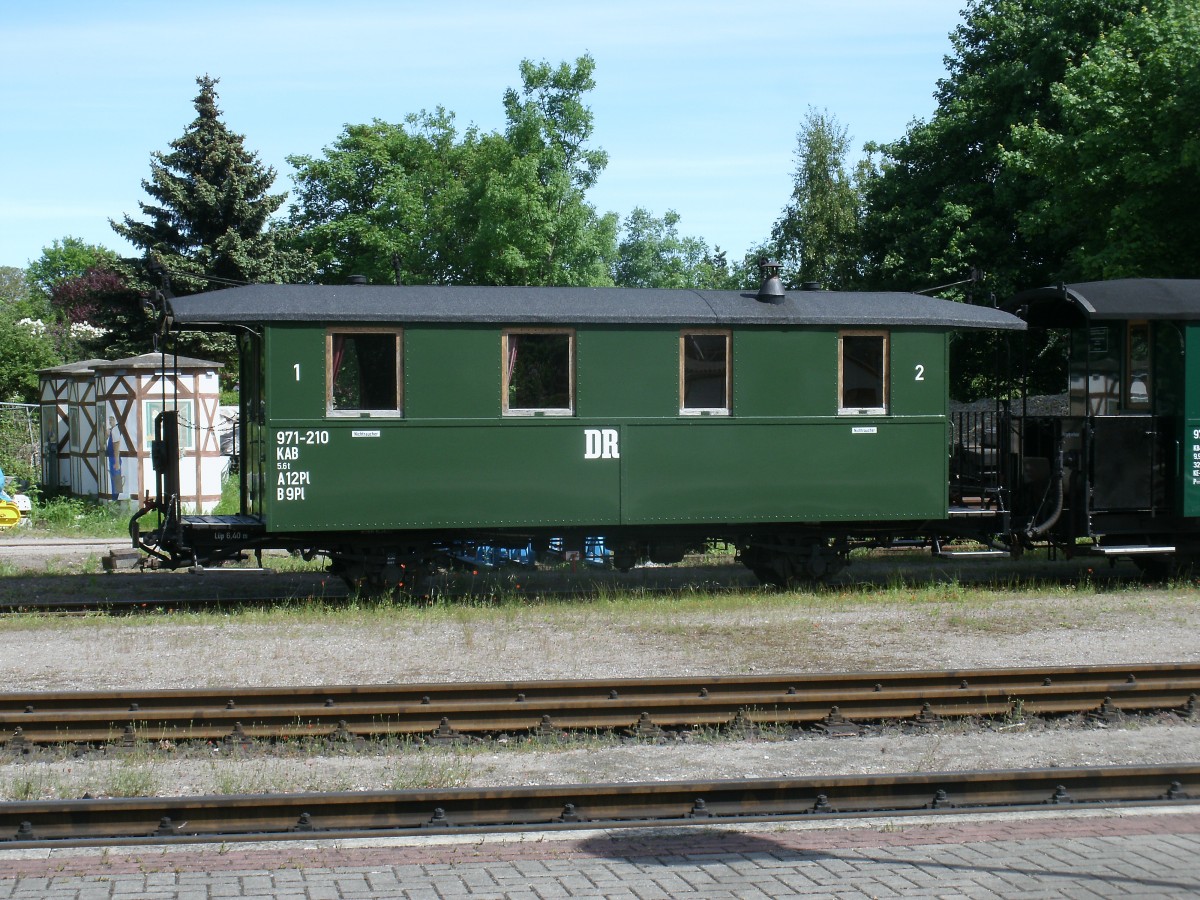 KAB 971-210 einst auf der Schmalspurstrecke Bergen/Rgen-Altenkirchen im Einsatz abgestellt,am 05.Juni 2013,in Putbus.
