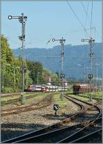 BB Talent als S-Bahn Vorarlberg und SBB EC von Zrich nach Mnchen im deutschen Bahnhof Lindau Reutin.
21.09.2011