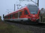 429 028,als RE 13006 Sassnitz-Rostock,am 04.November 2013,am Haltepunkt Stralsund Grnhufe.