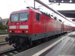 143 210-3 als S1 mit ziel Warnemnde im Bahnhof Rostock Hbf am 27.9.13