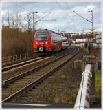 br-442-bombardier-talent-2/312601/der-442-285--442-785 Der 442 285 / 442 785 ein vierteiliger Bombardier Talent 2 der DB Regio Hessen als SE 40 'Mittelhessen-Express' Dillenburg - Gießen - Frankfurt/Main, hier am 23.12.2013 an einem Bü in Aßlar. 